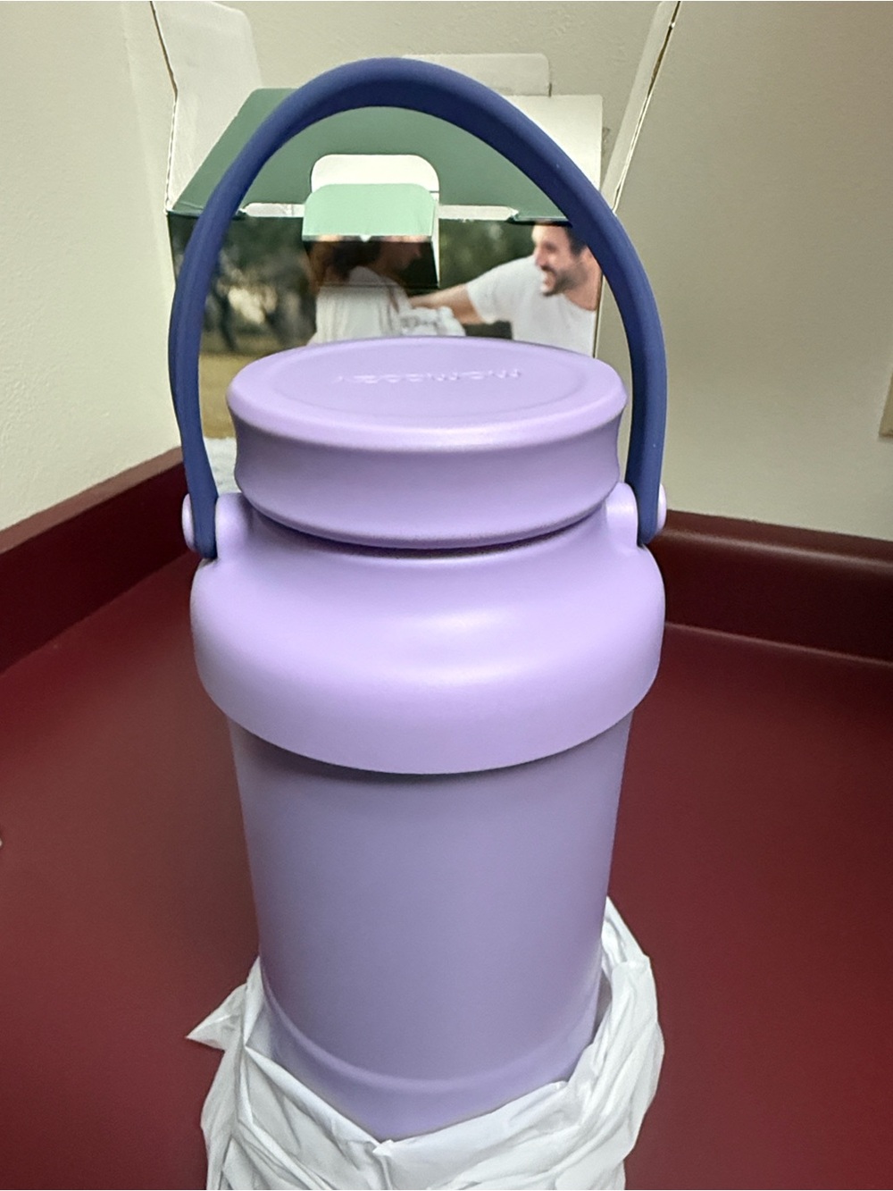 Momcozy portable breast milk cooler.